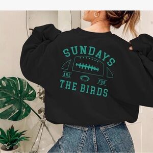 Black Graphic Sweatshirt with Green Print